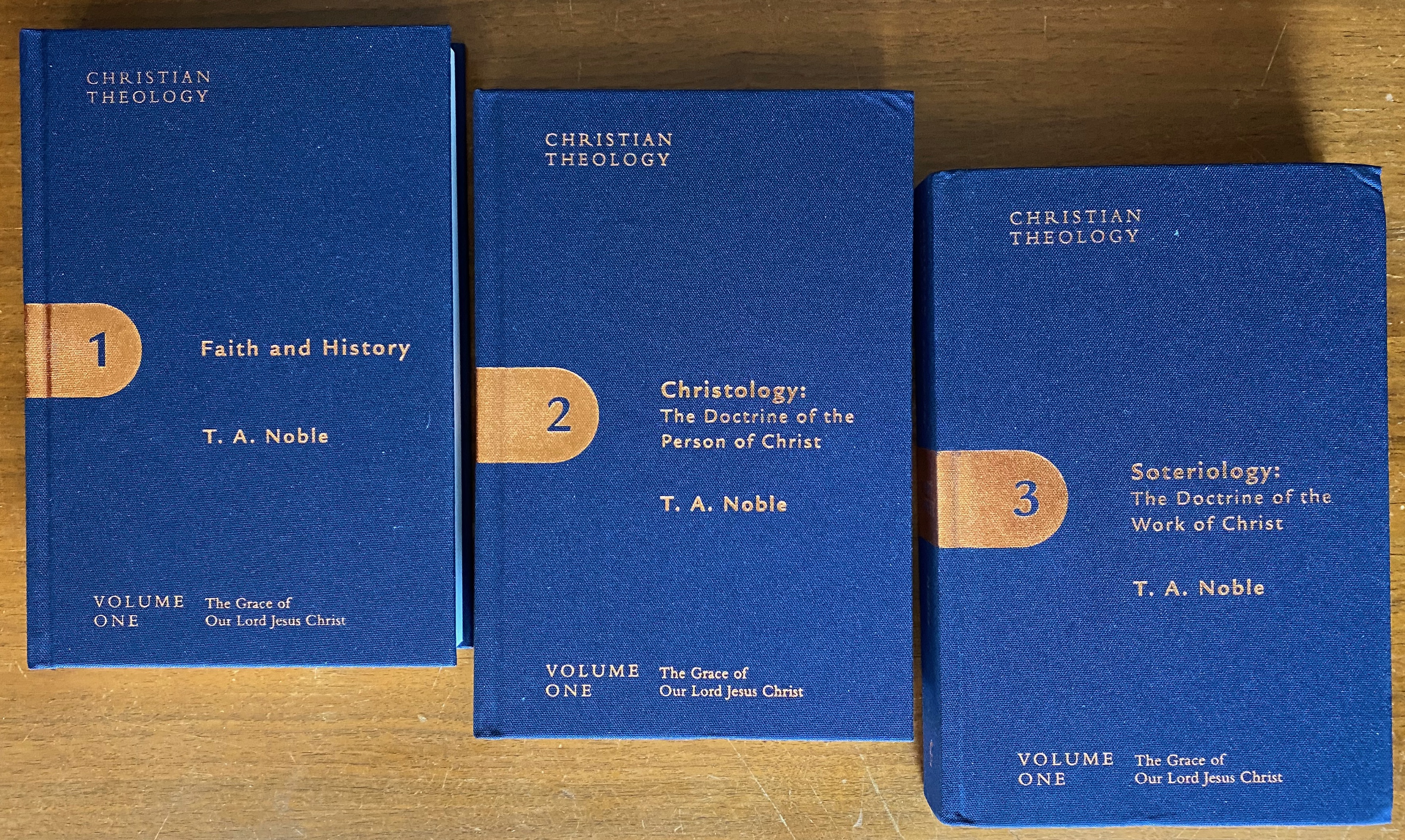 Thomas A. Noble, The Grace of Our Lord Jesus Christ, vol. 1 of Christian Theology, 3 vols. (Kansas City, Missouri: The Foundry Publishing, 2022). Covers of the three part volumes.